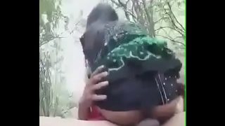 young couple having a very quick outdoor fucking in national park